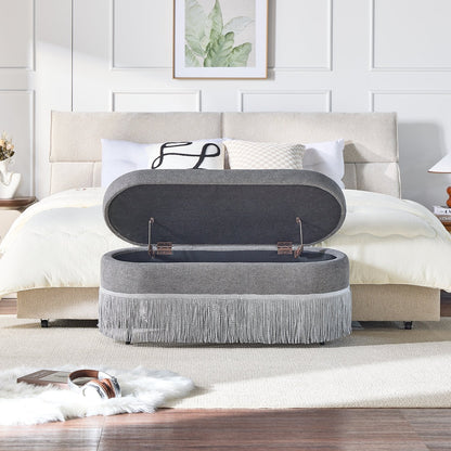 Oval Upholstered Storage Ottoman with Fringe Trim, 39.4"