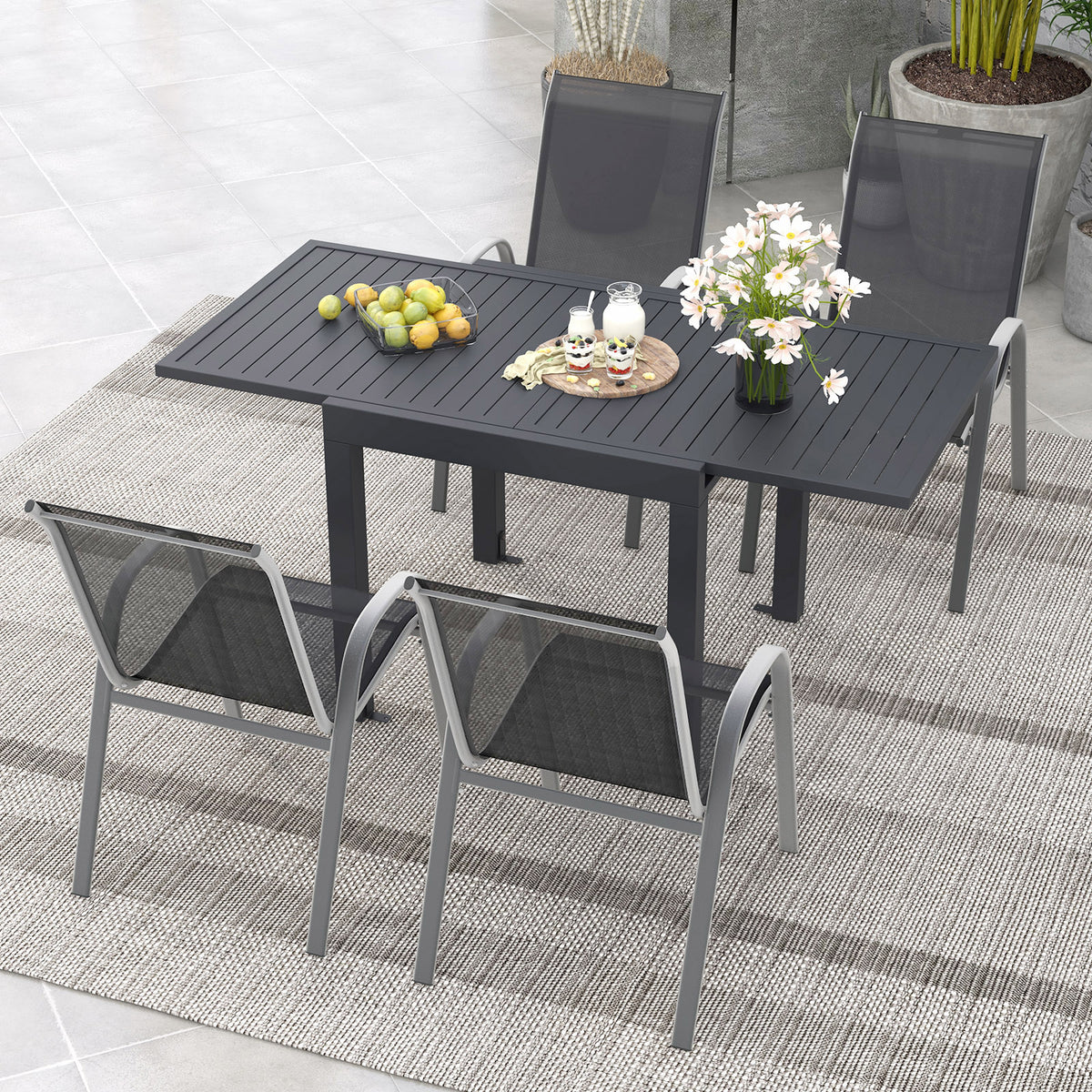 Extendable Patio Dining Set with 4 Stackable Chairs