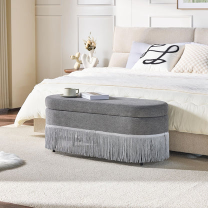 Oval Upholstered Storage Ottoman with Fringe Trim, 39.4"