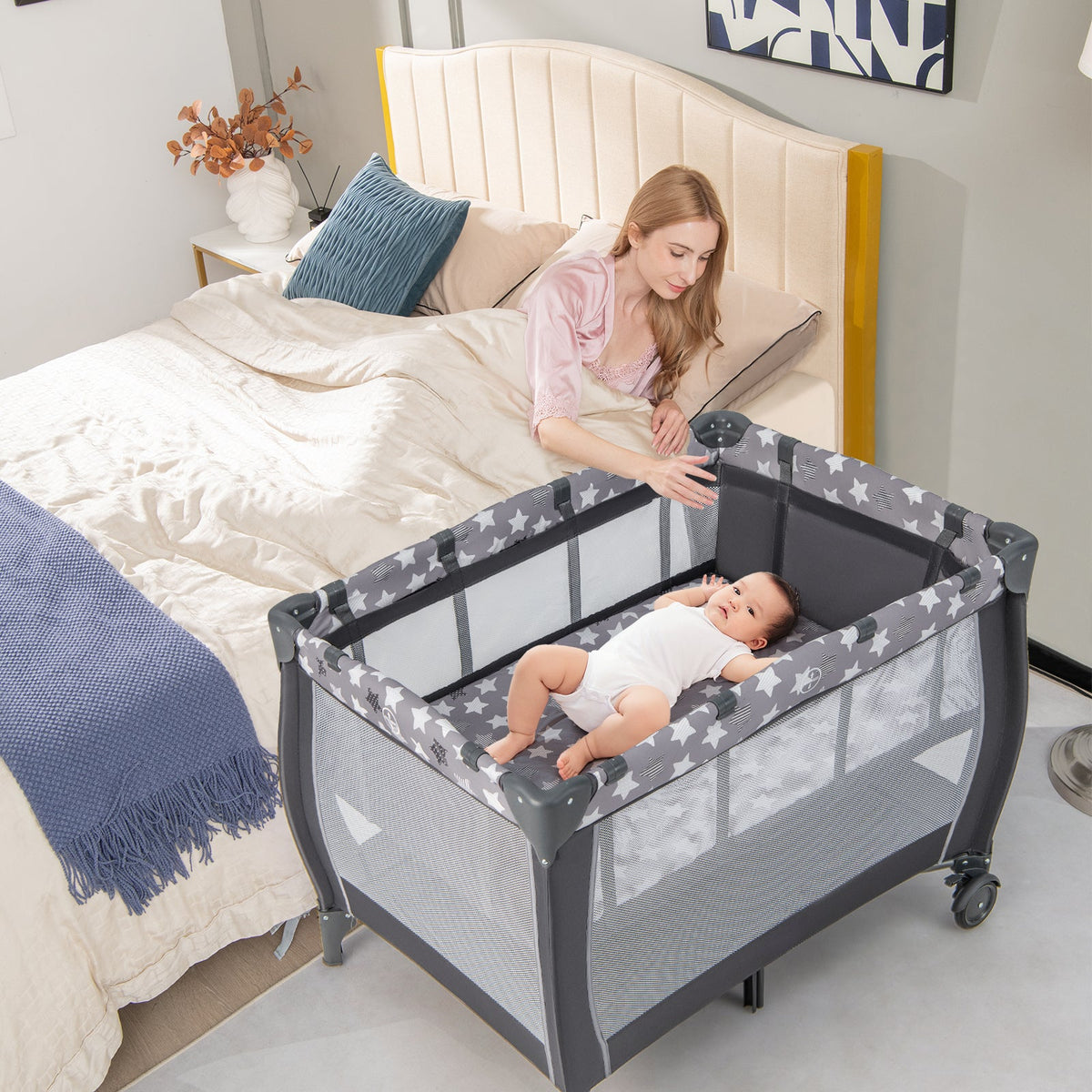 Portable Baby Playard with Changing Table Bassinet and Music Box