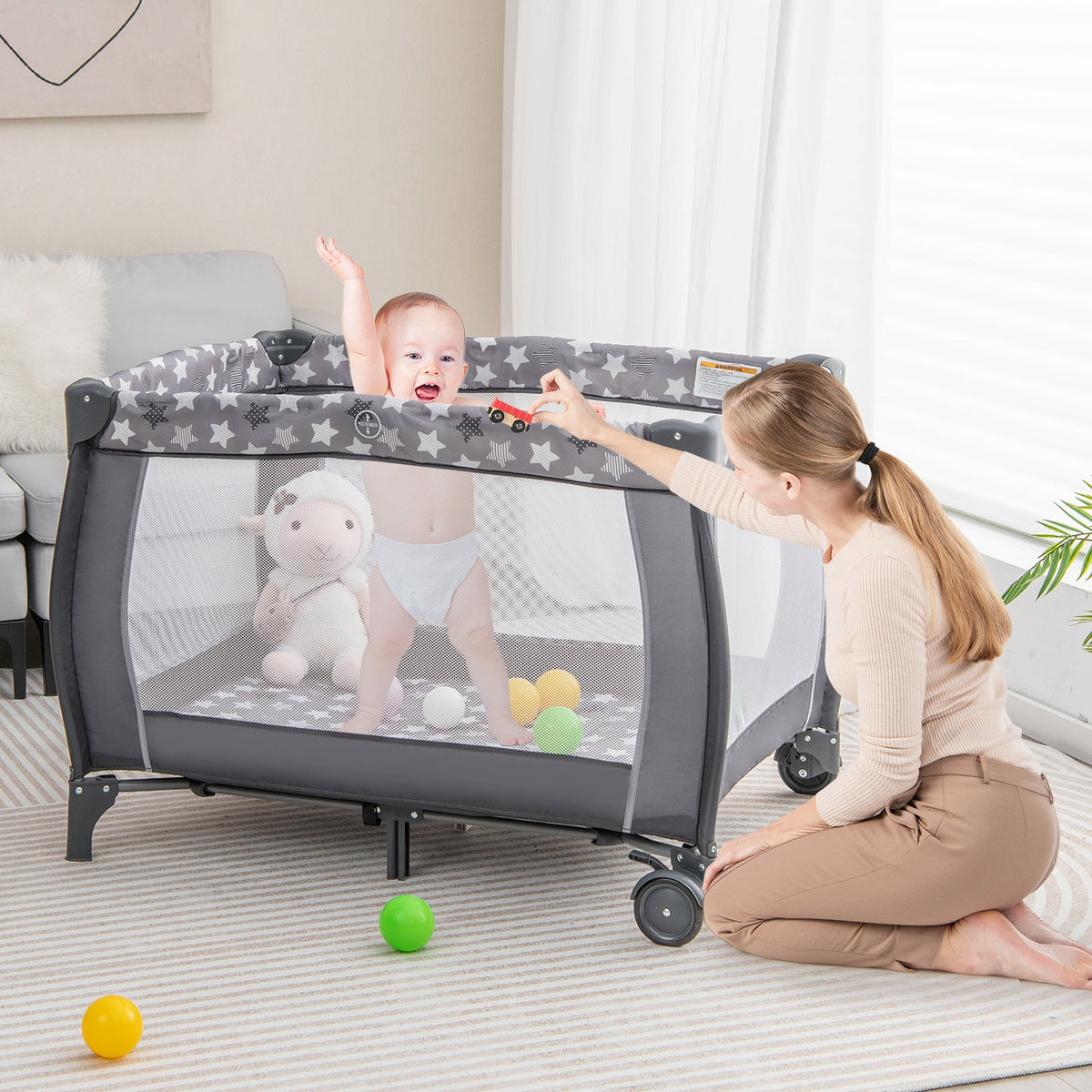 Portable Baby Playard with Changing Table Bassinet and Music Box