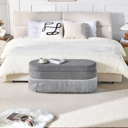 Oval Upholstered Storage Ottoman with Fringe Trim, 39.4"